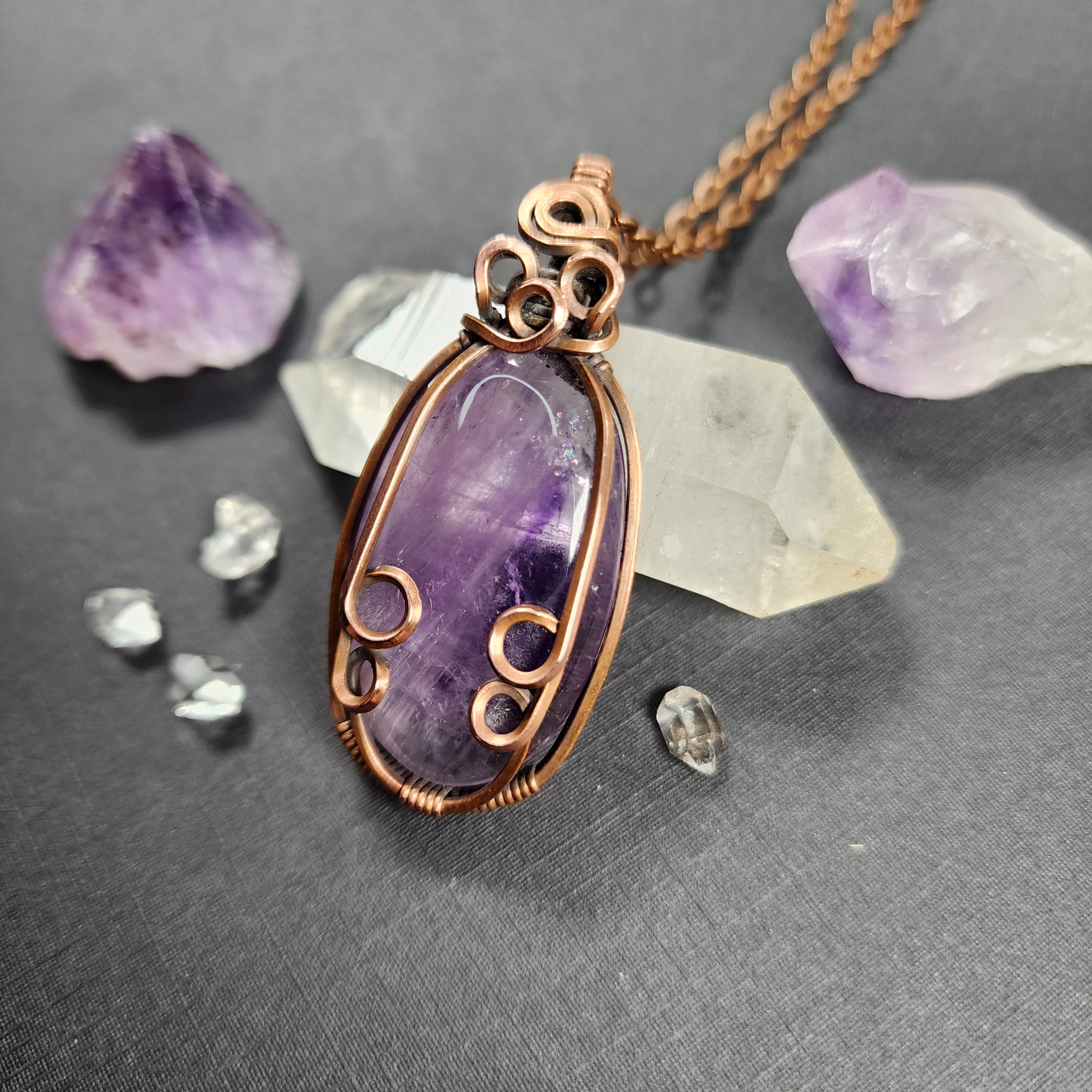 Keeping the Peace deals (amethyst) pendant knit by hand with copper wire, purple gemstone